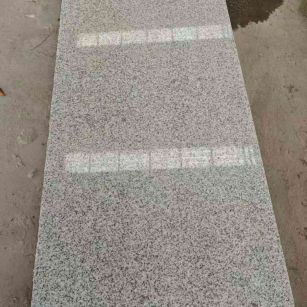 达州芝麻白光面毛板